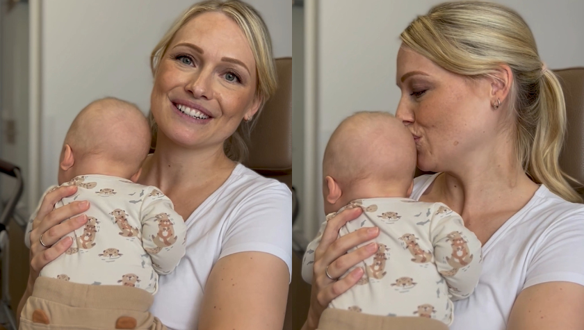Mutter mit Baby auf dem Arm